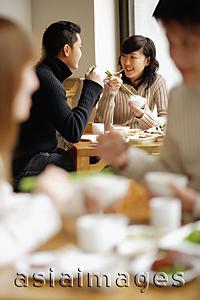 Asia Images Group - Couples eating at a restaurant