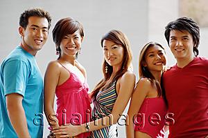 Asia Images Group - Group of young adults standing side by side, looking at camera