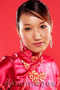 Asia Images Group - Woman in Cheongsam, head shot