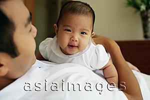 Asia Images Group - Father carrying baby daughter, high angle view