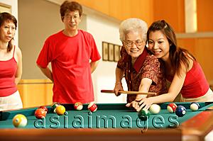 Asia Images Group - Three generation family, playing billiards