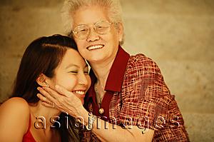 Asia Images Group - Grandmother with granddaughter, portrait