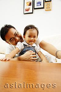 Asia Images Group - Father holding young daughter