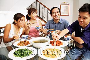 Asia Images Group - Family eating at home