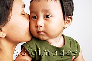 Asia Images Group - Mother kissing baby boy