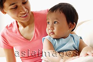 Asia Images Group - Mother with arm around baby boy