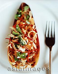 Asia Images Group - Spicy chicken salad in banana heart