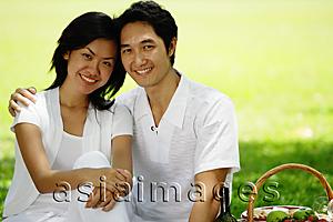 Asia Images Group - Couple in park, smiling at camera