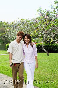 Asia Images Group - Couple walking in park