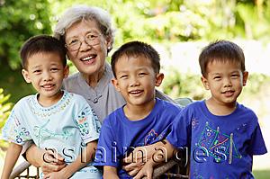 Asia Images Group - Grandmother with three grandsons