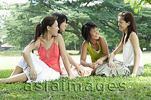 Asia Images Group - Young women sitting in park
