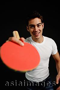 Asia Images Group - Man holding table tennis racket