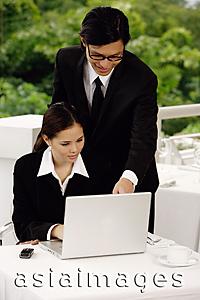 Asia Images Group - Businesspeople using laptop