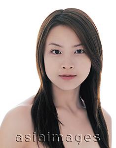 Asia Images Group - Young woman with long straight hair looking at camera, portrait