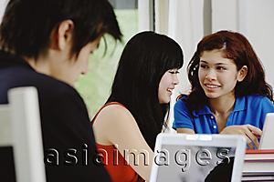 Asia Images Group - Teenagers using laptop
