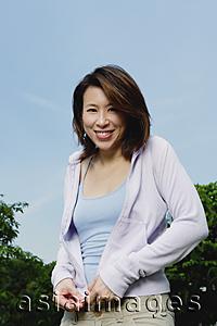 Asia Images Group - Woman with cardigan, outdoors
