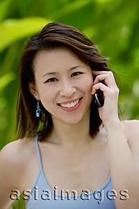 Asia Images Group - Woman using mobile phone