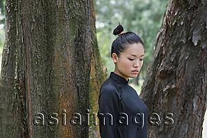 Asia Images Group - Young woman in traditional Chinese costume, outdoors