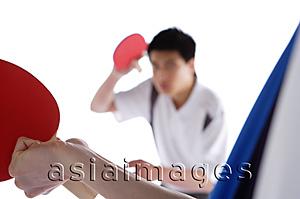 Asia Images Group - Two men playing table tennis