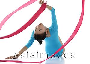 Asia Images Group - Rhythmic gymnastics, woman doing routine with ribbon
