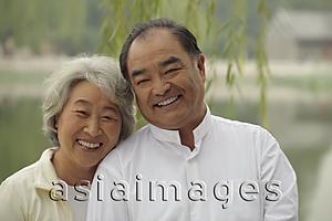 Asia Images Group - Older couple smiling together outdoors