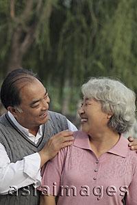 Asia Images Group - Older couple smiling at each other