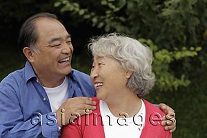 Asia Images Group - Older couple laughing together