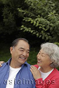 Asia Images Group - Older couple looking at each other smiling