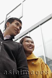 Asia Images Group - Young couple smiling together outdoors