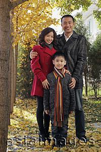 Asia Images Group - Family with young boy standing outdoors