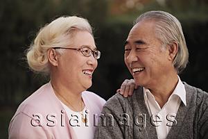 Asia Images Group - Older couple looking at each other and smiling