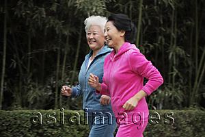 Asia Images Group - Two older women jogging together