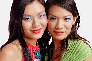 AsiaPix - Two women looking at camera, wearing blue eye shadow