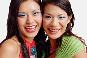 AsiaPix - Two women looking at camera, smiling