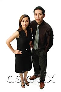 AsiaPix - Couple standing, looking at camera, woman with hand on hip