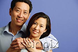 AsiaPix - Couple looking at camera, portrait