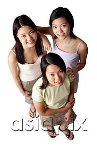 AsiaPix - Three young women, looking up at camera