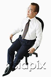AsiaPix - Businessman sitting on office chair