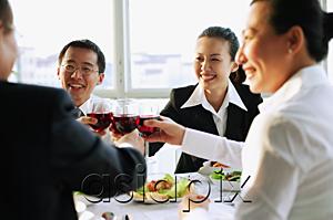 AsiaPix - Executives holding wine glasses and toasting