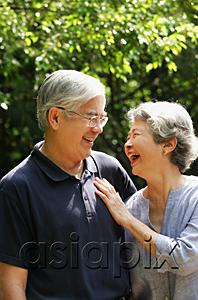 AsiaPix - Senior couple facing each other, smiling