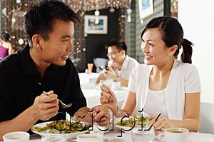 AsiaPix - Couple eating at restaurant