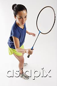 AsiaPix - Woman holding badminton racket, high angle view