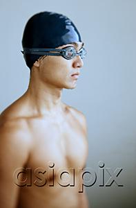 AsiaPix - Man in swimming cap and goggles, looking away