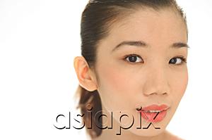 AsiaPix - Asian woman looking at camera, head shot