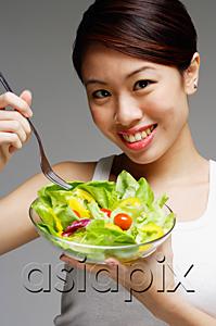 AsiaPix - Woman holding bowl of salad