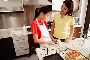 AsiaPix - Mother and daughter in kitchen