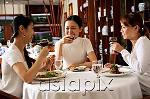 AsiaPix - Women in restaurant, eating