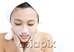 AsiaPix - Woman washing her face