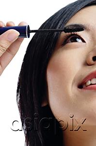 AsiaPix - Woman applying mascara