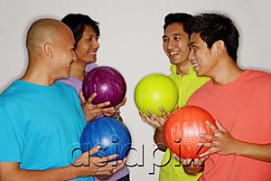 AsiaPix - Four men holding bowling balls, smiling